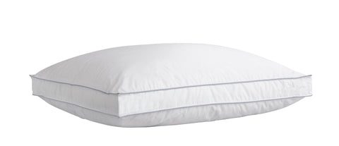 One Climarest Cooling Gusset Pillow stacked atop one another. All white except there are two stripes parallels to one another and it kind of gives the allusion of creating a rectangle across the sides of the pillow without actually having connecting lines.