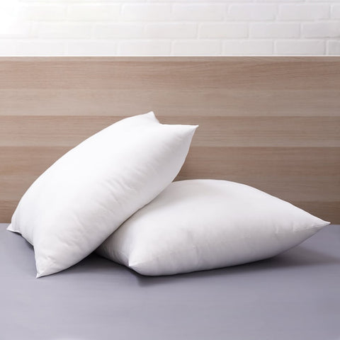 The Polyester Euro Pillow instead of the classic pillow which is rectangular, the Euro Pillow is squared. There are two in the image one up laying flat and the other leaning on it in beside.