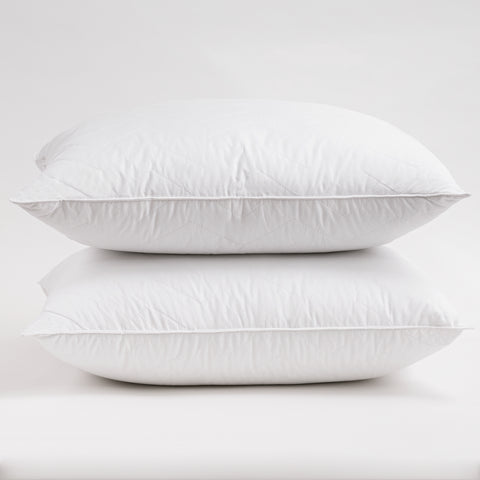 Herringbone Quilted Pillow 2-Pack one on top of the other on a white background. The pillows have several horizontal lines running across it, with V shapes alternating facing up and down.