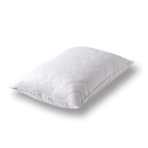 Side profile and at the corner of the Billowy Clouds Pillow with 4 inch quilted cloud pattern and is filled with high-quality, gel-fiber polyester filling with a 300 thread count cotton.