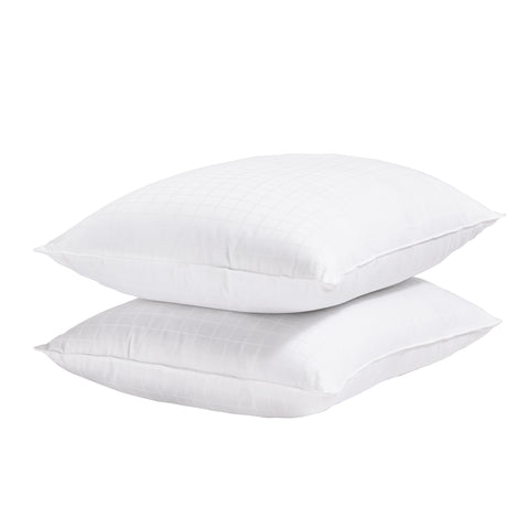 Two ComfortPlush Down Alternative Pillows stacked atop one another with a white background.