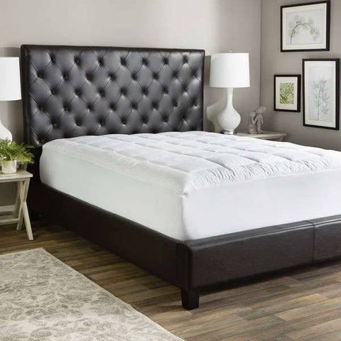 DownLinens 300 Thread Count Luxury Waterproof Mattress Pad displayed on black bedframe. 