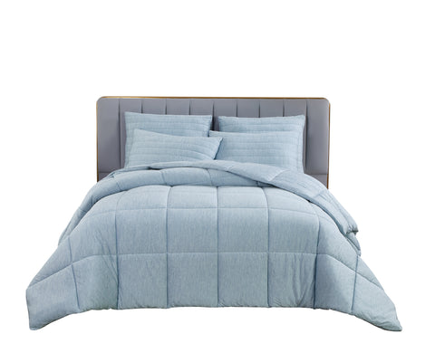 A completely white background, with a bed in center frame. There is a grey headboard with multiple pairs of long rectangle on top of one another going across the headboard. Four baby blue pillows leaning on the headboard, with a beautiful fluffy baby blue comforter/blanket.