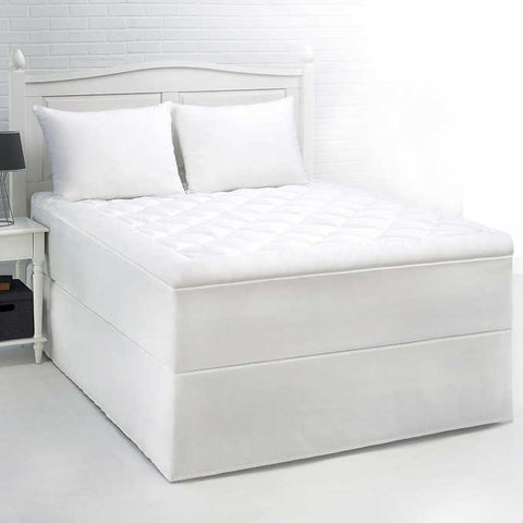 Cozy Comfort Cotton Mattress Pad with diamonds going along the top. The sides have no design. The product is white.