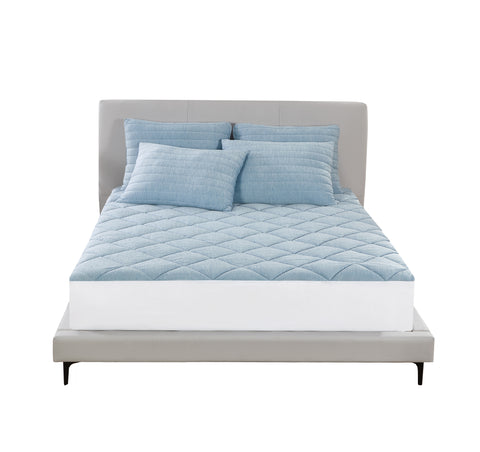A completely white background with a bed center frame. Grey bed frame and head board with the front two black legs of the bed visible. On the bed a four light blue blues, two beside each other with two atop those. The left pillow is askew, leaning on the right pillow a bit. Then there is a light blue mattress pad, the sides are white as seen in the front of the image above the base of the bed.