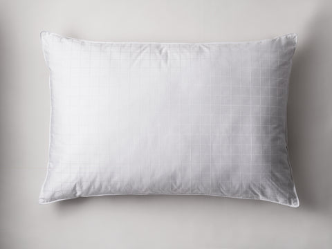 Plush Perfect Gel Fiber Pillow (Overstuffed) (Set of 2) only one pictured here. The single white pillow is laying flat on a white background. The pillow has mini squares across it all.