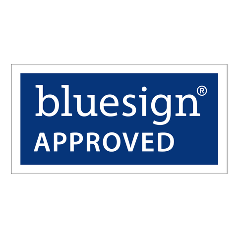 Bluesign Approved image. It's a blue rectangle with white outline. On the top half of the rectangle is white text that says "bluesign" with the registered trademark symbol above the "n." Below is white text that says "APPROVED."