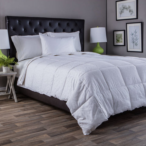 One DownLinens 300 Thread Count Down Alternative Comforter with square stitching all across the entirety of the comforter.