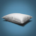 On a blue background is the Perfect White Goose Down Pillow - 50/50 Fill - Medium Plush Support. Just a single white pillow laying slight angle.